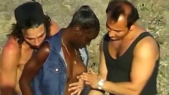 Two White Men Pleasure A Black Woman By The Ocean