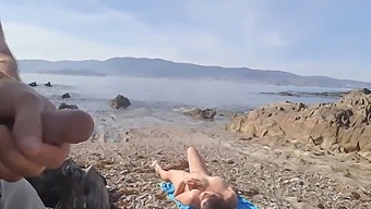 A Nudist Milf Receives A Public Flash From A Man On The Beach, Leading To A Sexual Encounter